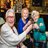 Three ladies cheersing with a glass of champagne.